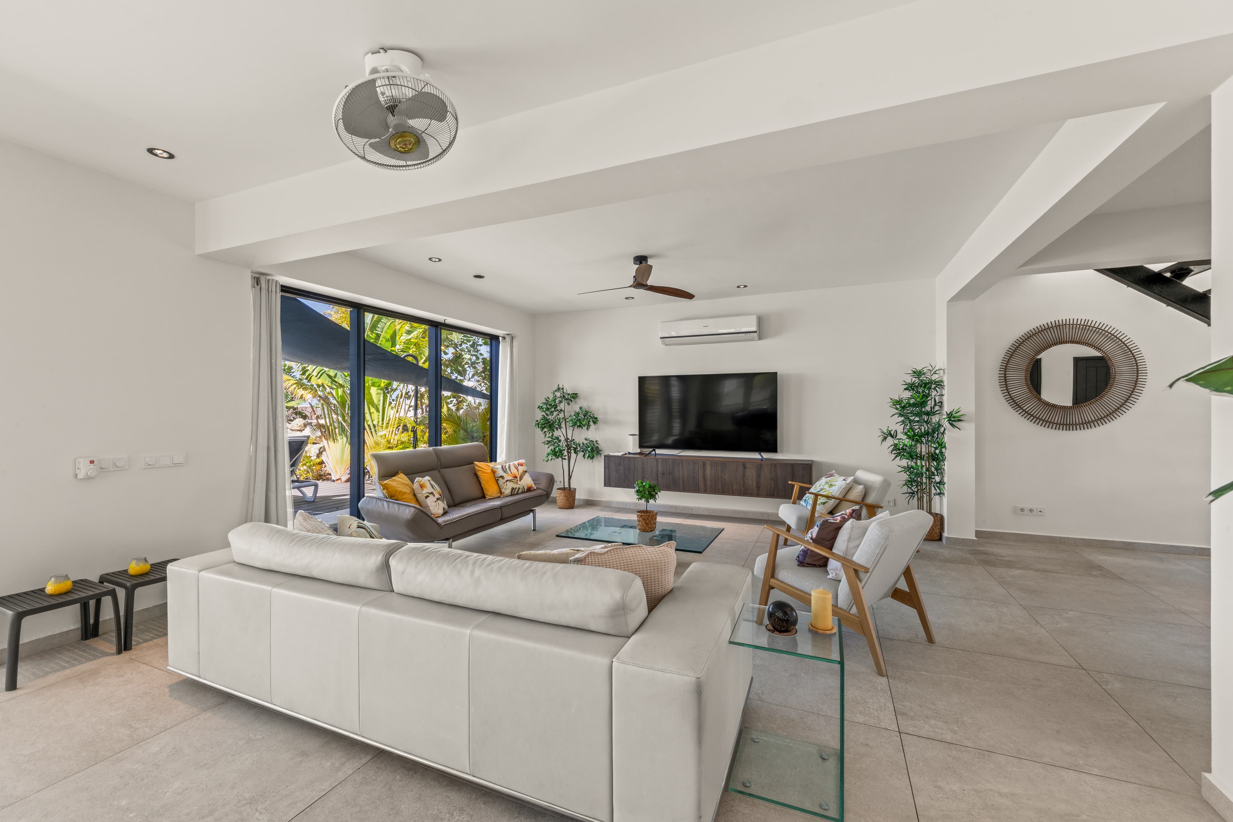 living room with large 85" smart TV